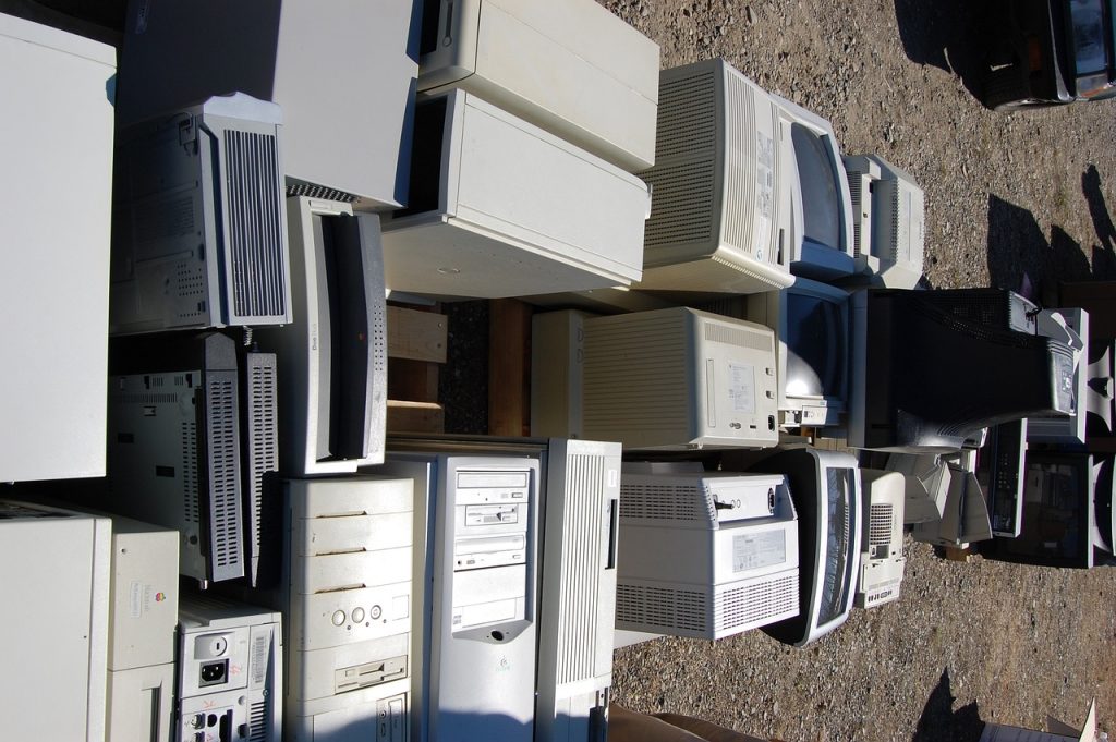 Old computers lined up for recycling and sustainable living