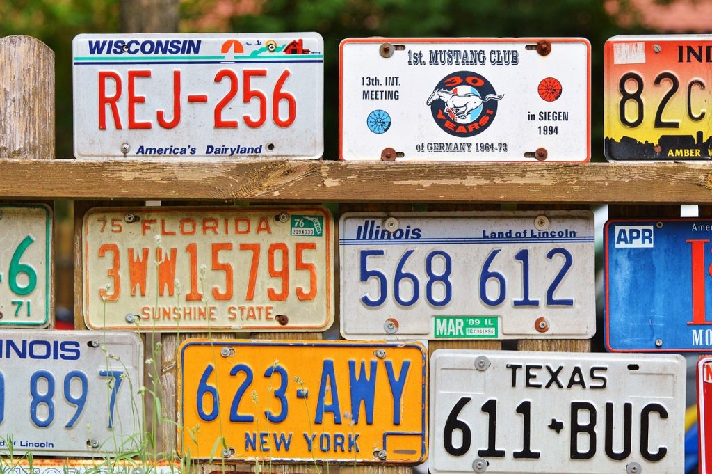 Stacked old license plates