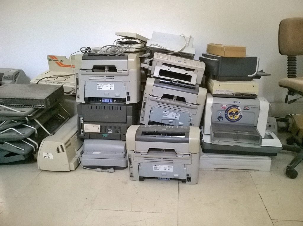 An old printer set aside for recycling and safe disposing