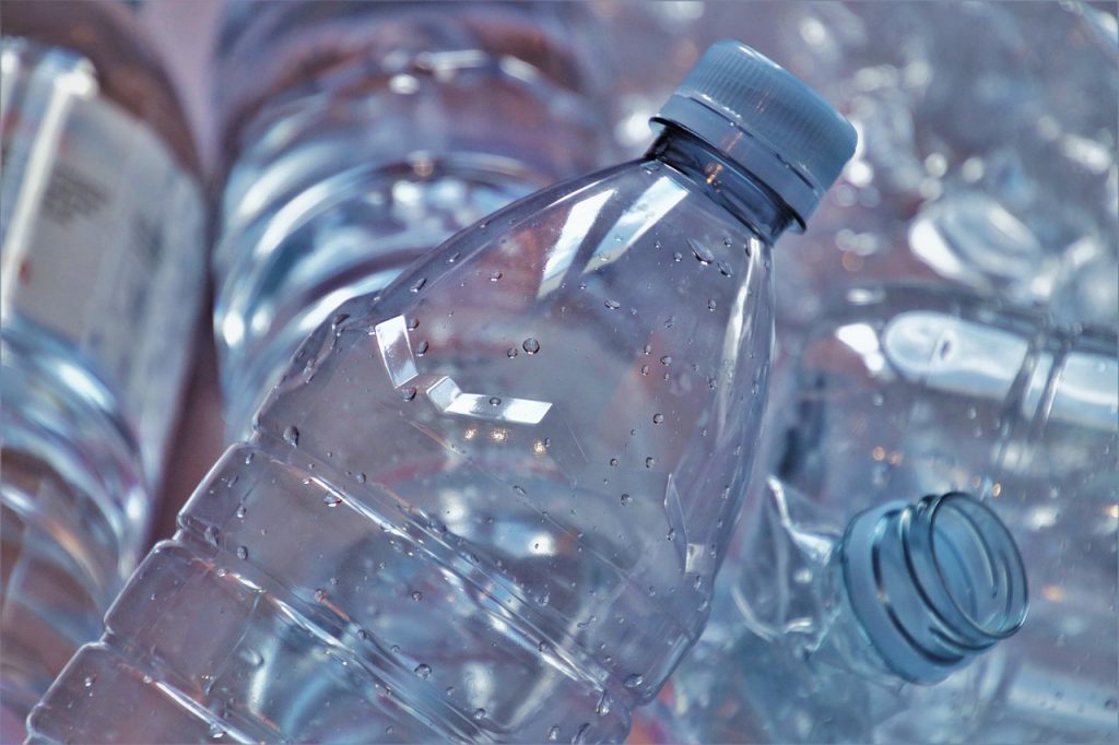 Plastic bottles sorted for recycling and highlighting the benefits of recycled plastic